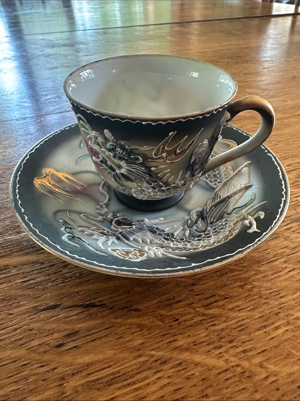 50’s/60’s Vintage Dragon Ware Tea Cup and
Orphaned Merit Occupied Japan saucer